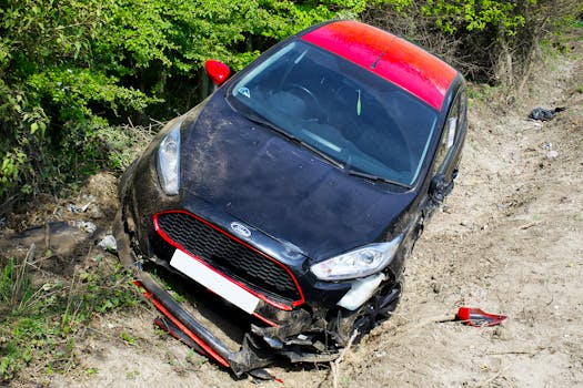 Damaged car after an accident on a dirt road in Welwyn Garden City, UK.