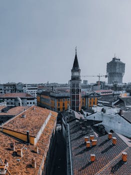 pexels-photo-5360472-5360472 Picturesque scenery of bell tower of ancient San Gottardo in Corte church located on street near aged buildings in Milan